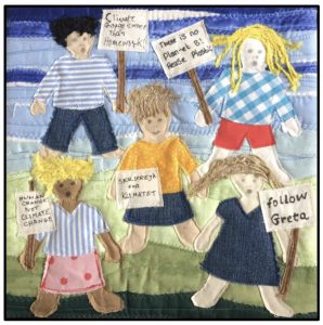 Textile panel with children holding placards